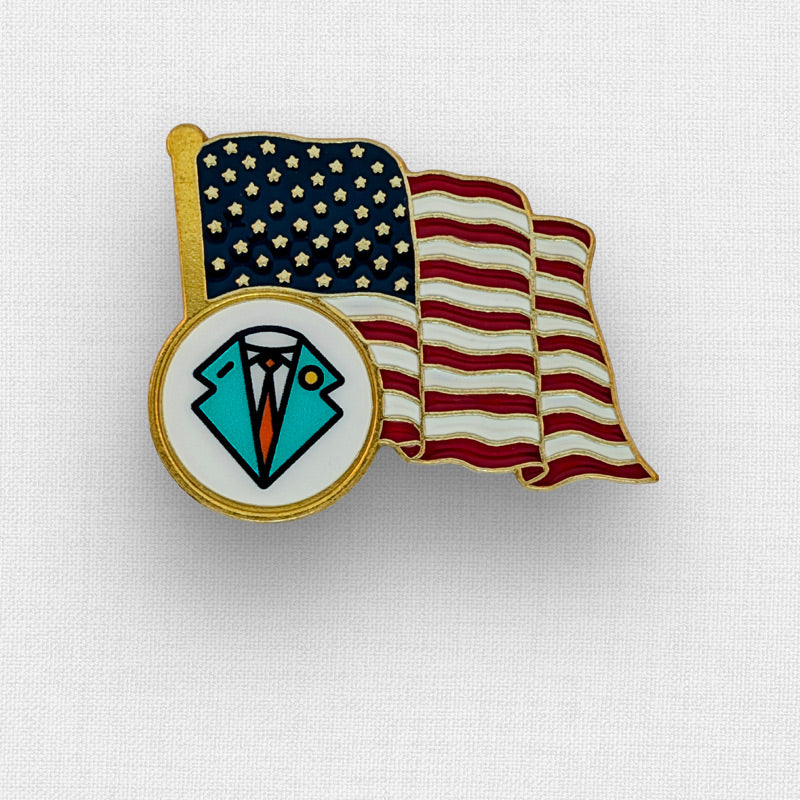 An American flag pin with a logo in the bottom left corner